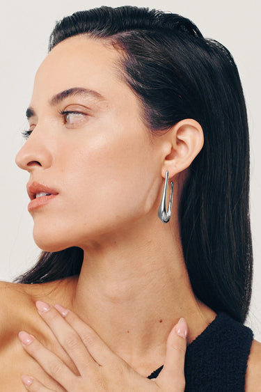 ATARAXIA Earrings. Elongated elliptical hoops, silver, handmade, hypoallergenic, water-resistant